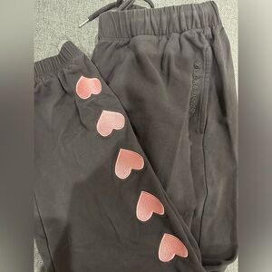 Lightly worn Dandy World Wide “Heart on my sleeve” sweatpants.